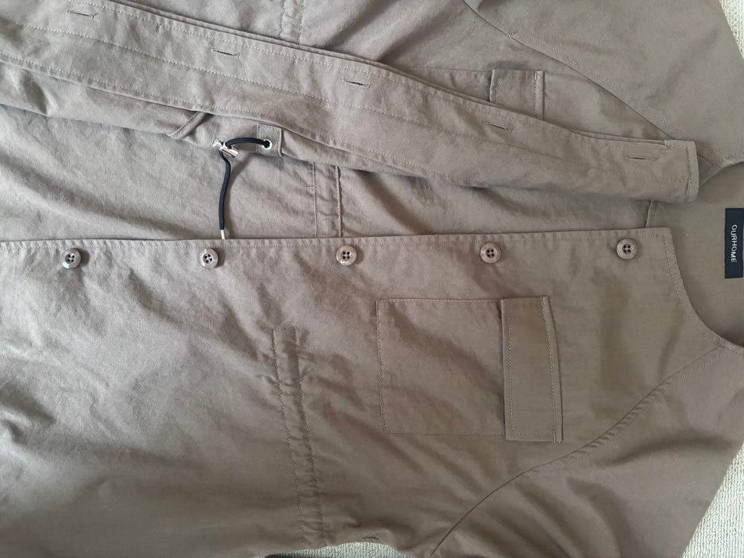 OUR ツイル素材のサファリジャケット