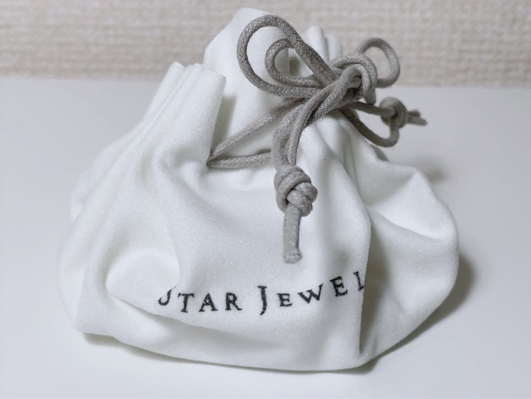 ★値引★スタージュエリー クロッシング スター ピアス K10 ホワイトトパーズ