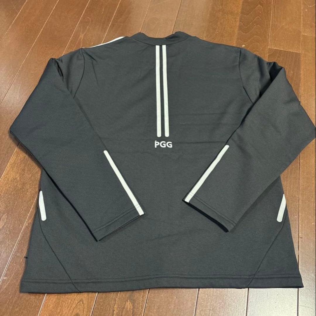 パーリーゲイツPGGストレッチダンボール裏起毛モックネックブラックサイズ5