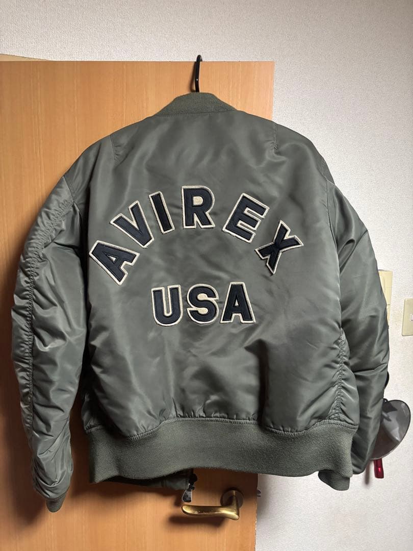 大人気モデル！AVIREX MA-1 COMMERCIAL LOGO