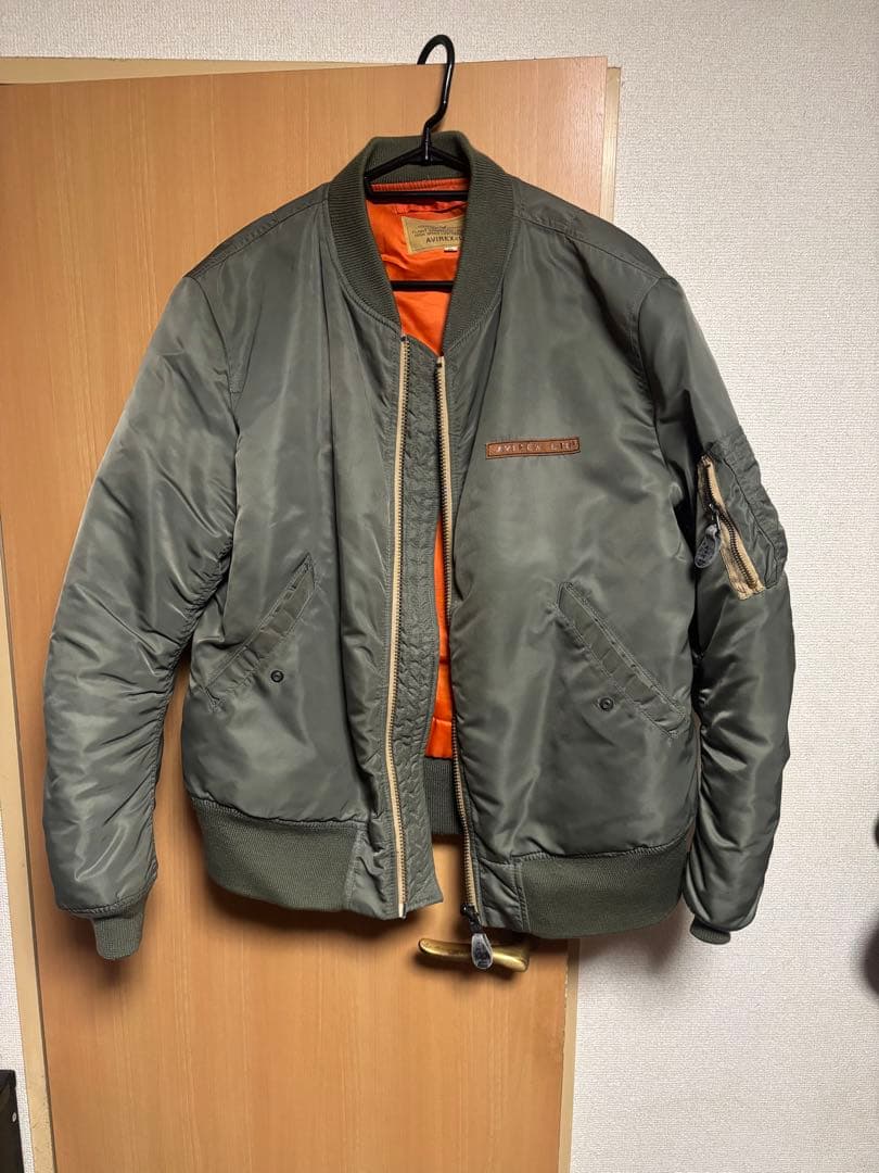 大人気モデル！AVIREX MA-1 COMMERCIAL LOGO