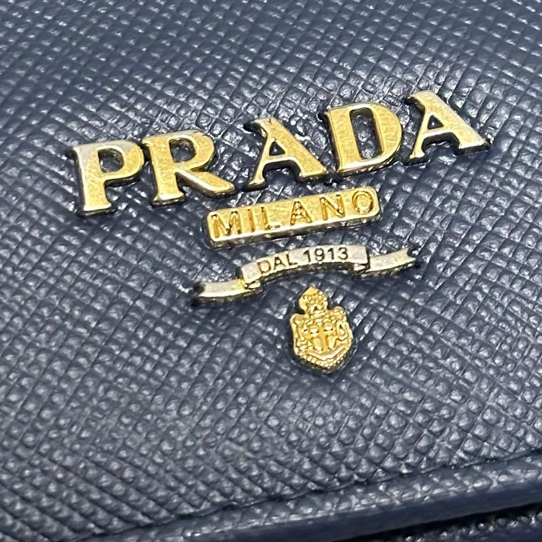 PRADA プラダ　折り財布　ゴールドロゴ　ブルー　サフィアーノレザー