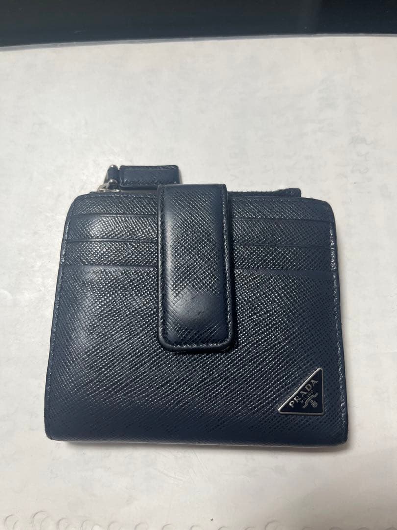 プラダ 二つ折り財布 フラグメントケース 三角プレート サフィアーノ 濃紺　財布