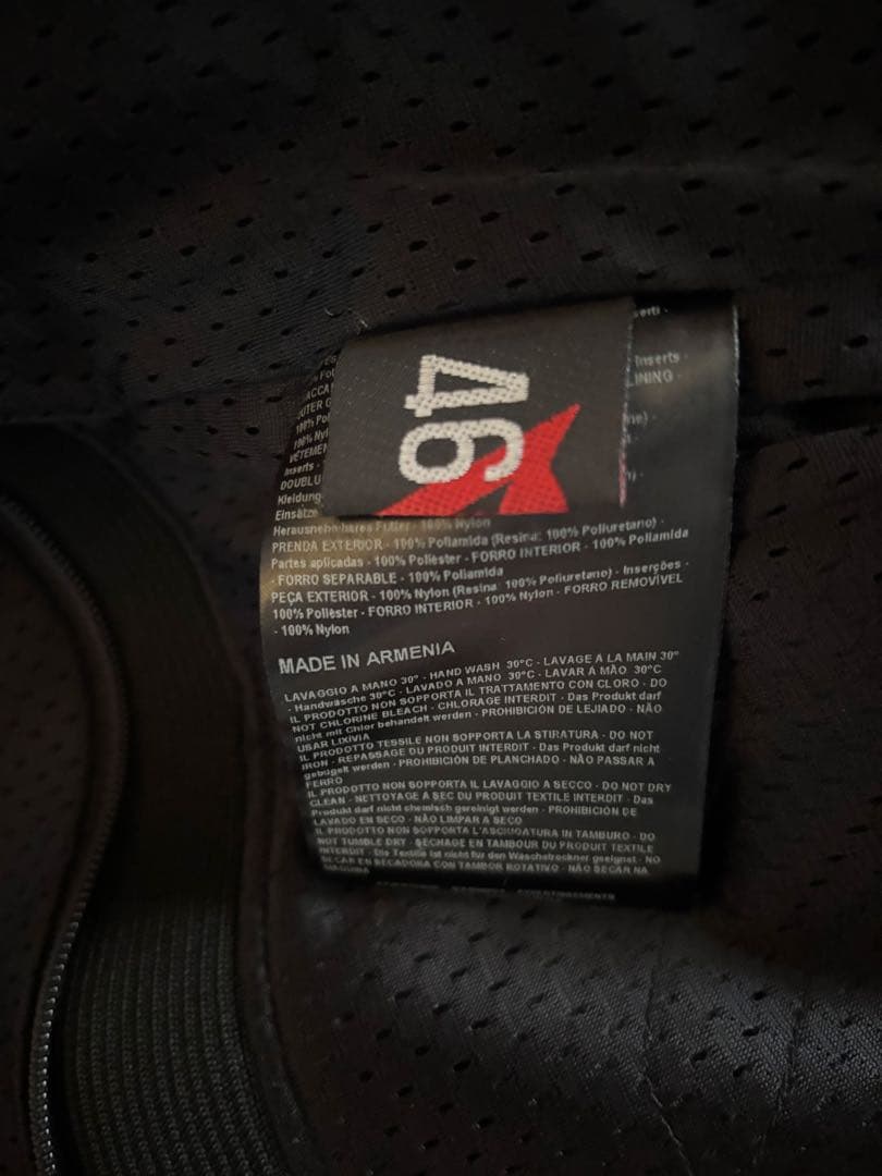 Dainese VR46 ジャケット 黒/蛍光イエロー