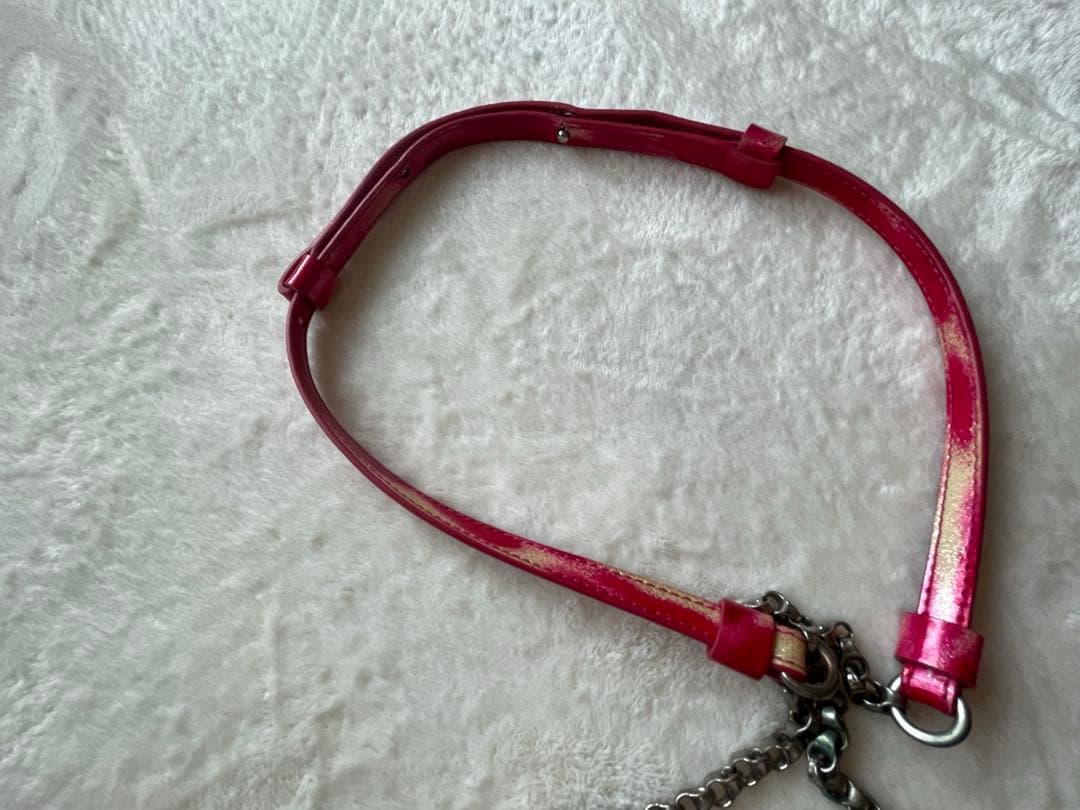 クリスチャンルブタン　スタッズ付きピンククラッチバッグ