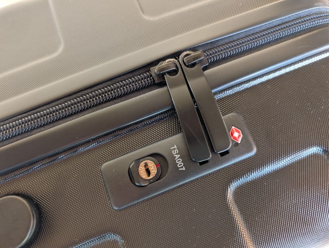 無印：キャリーバーの高さを自由に調節できるストッパー付きハードキャリー（62L）