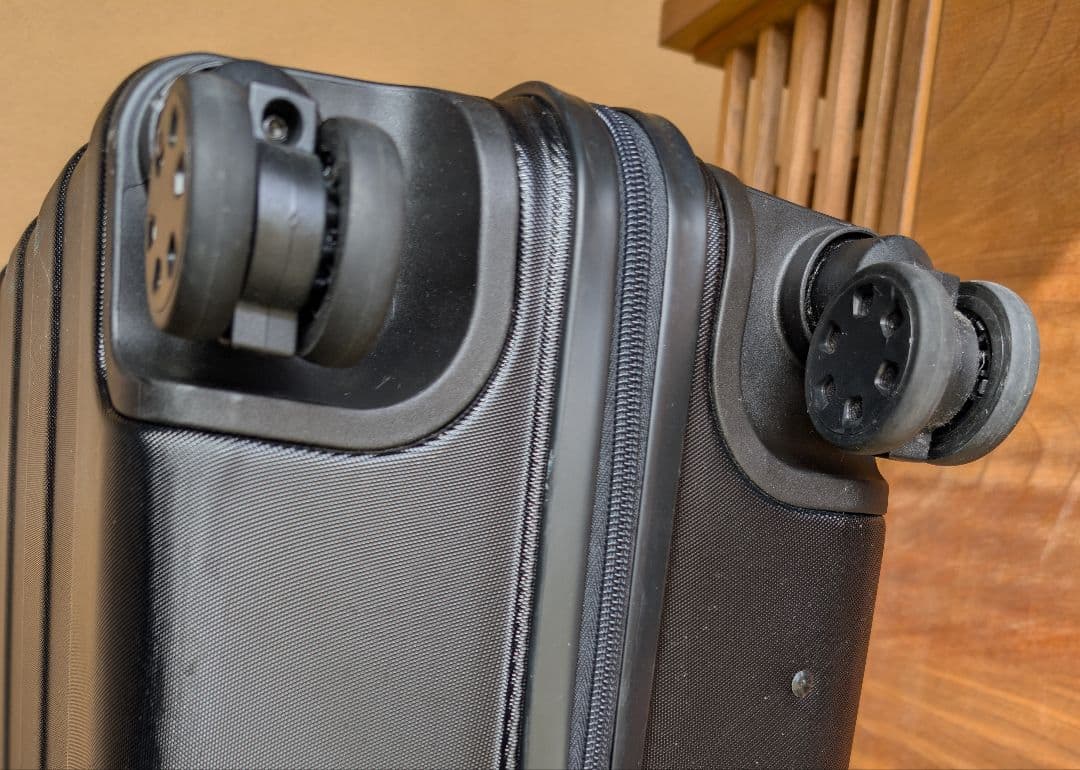 無印：キャリーバーの高さを自由に調節できるストッパー付きハードキャリー（62L）