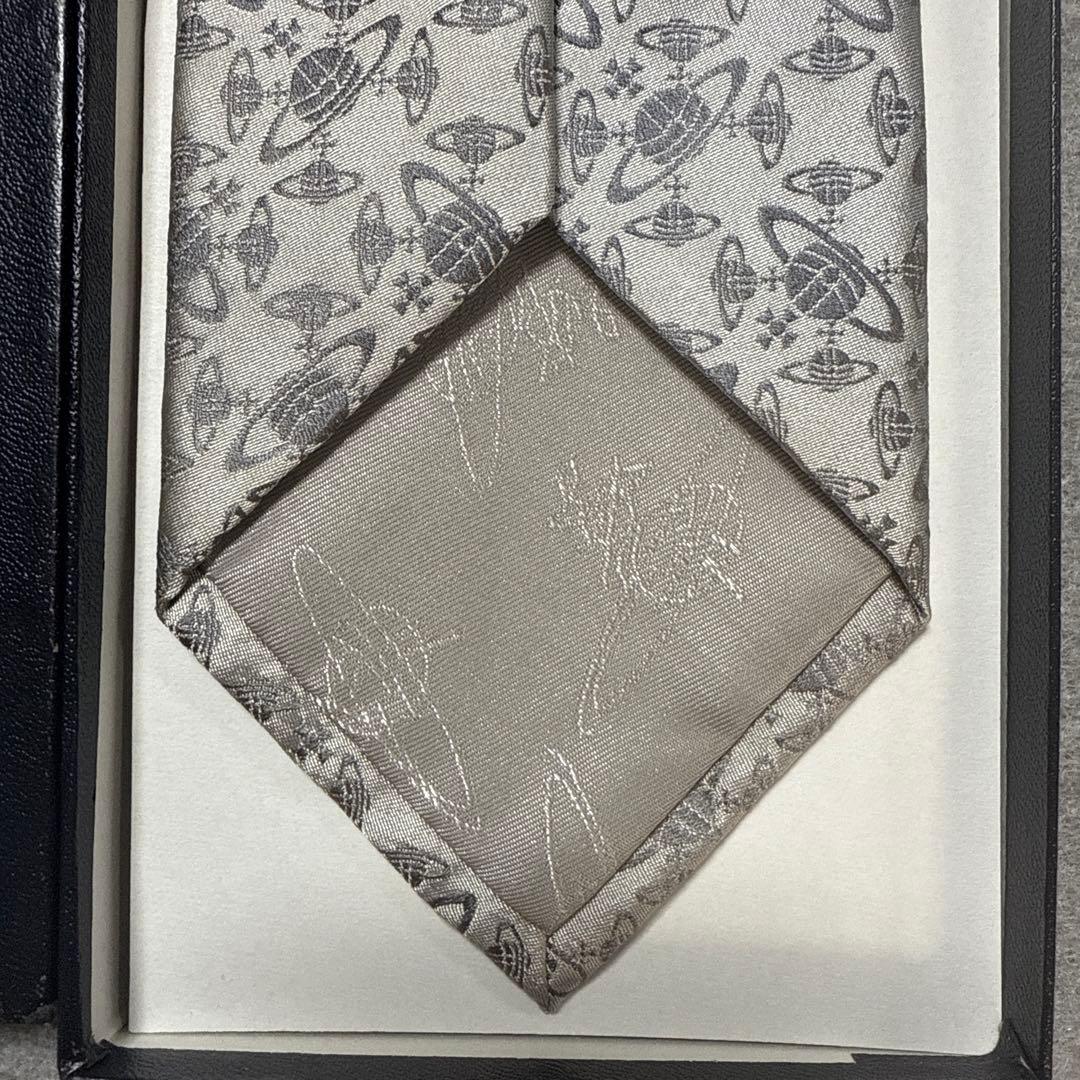 未使用タグ付　ヴィヴィアンウエストウッド　ネクタイ　銀　オーブ柄総柄　結婚式