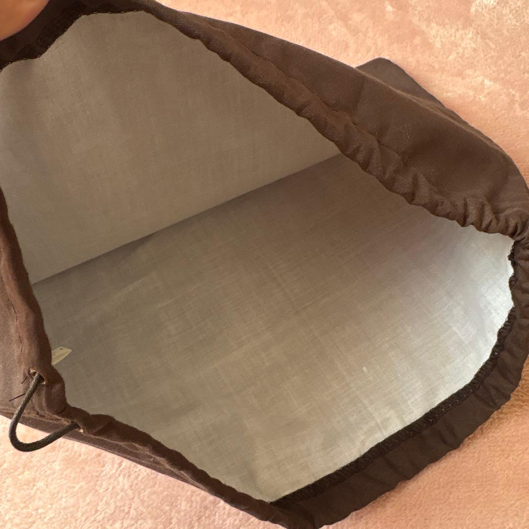 GUCCI マフラー　ブラック　ロゴマフラー(おまけの巾着付)