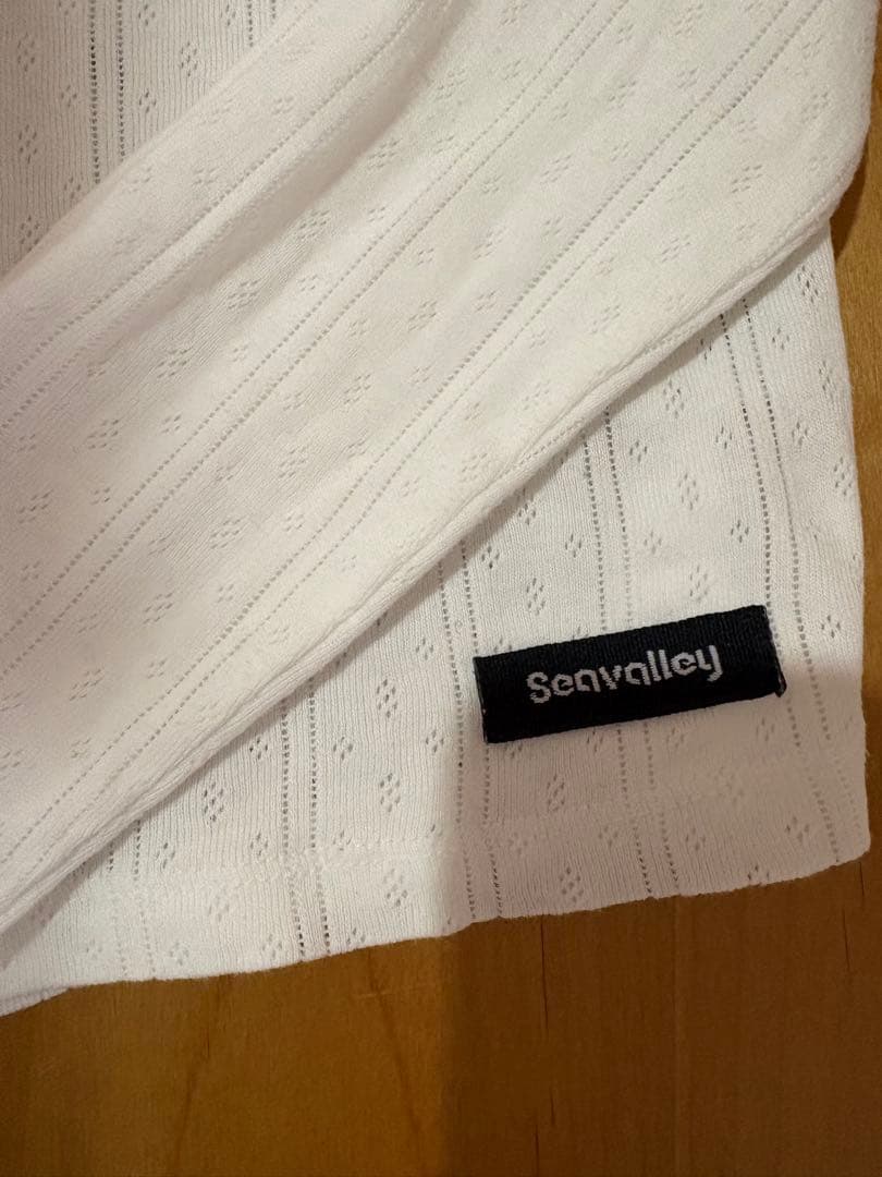 トップス SEA HENLEY NECK L/S TEE