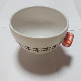 赤いバス取っ手付き陶器茶碗