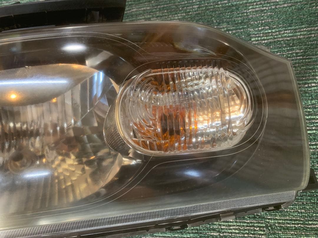 日産 キューブZ12左右ヘッドライト ハロゲンSTANLEY P8190