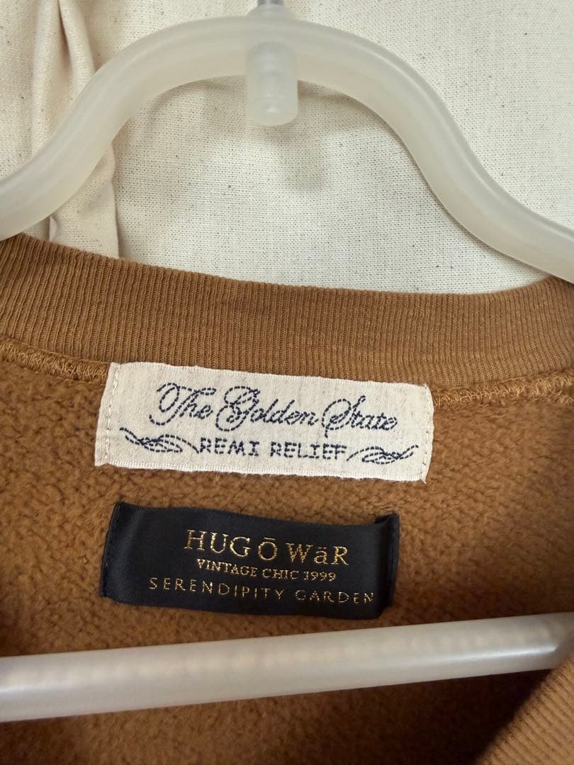 REMI RELIEF × HUG Õ WäR THIS WAYキャメル