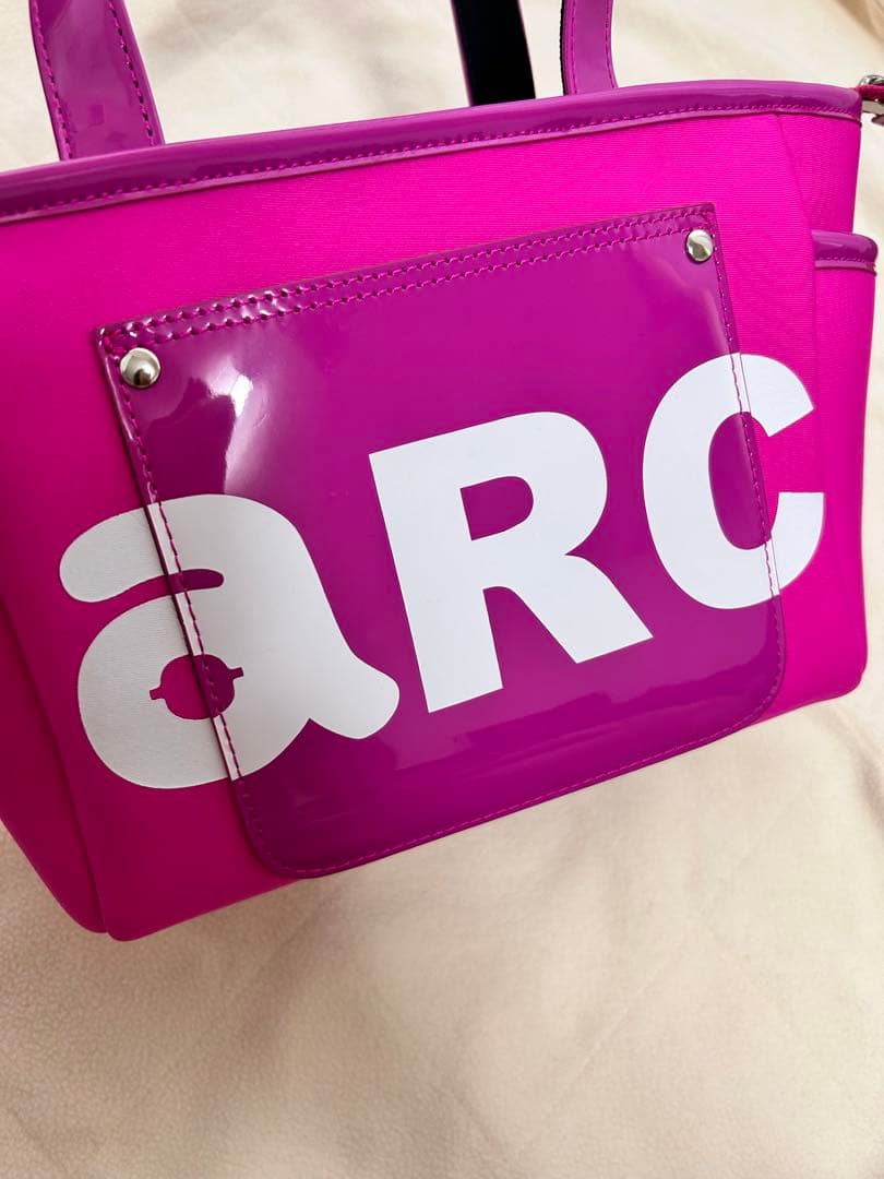 ピンク トートバッグ arc ロゴ入り アルチビオ