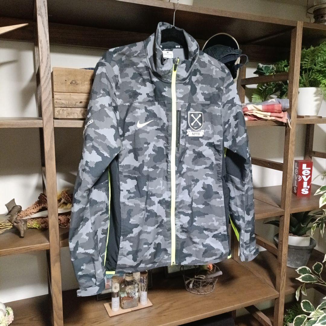 Lサイズ ナイキNFTB サッカー　ウェア　ナイロンジャケット　カモフラ迷彩