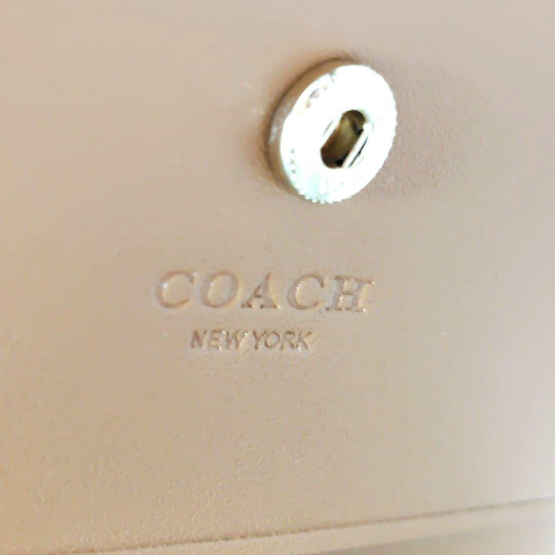新品未使用⭐COACH ブラウン 二つ折り財布　シグネチャー　馬車ロゴ