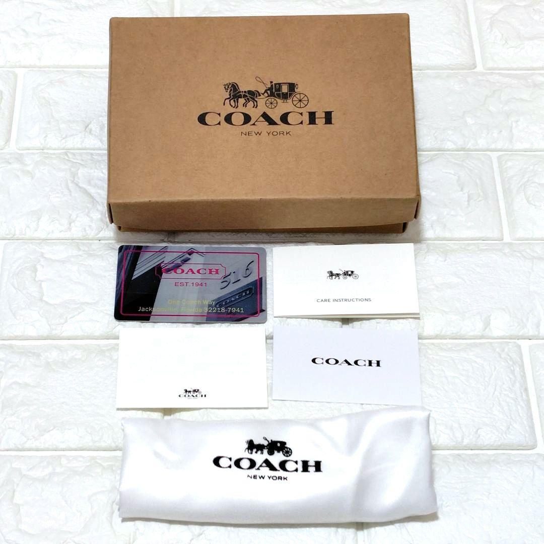 新品未使用⭐COACH ブラウン 二つ折り財布　シグネチャー　馬車ロゴ