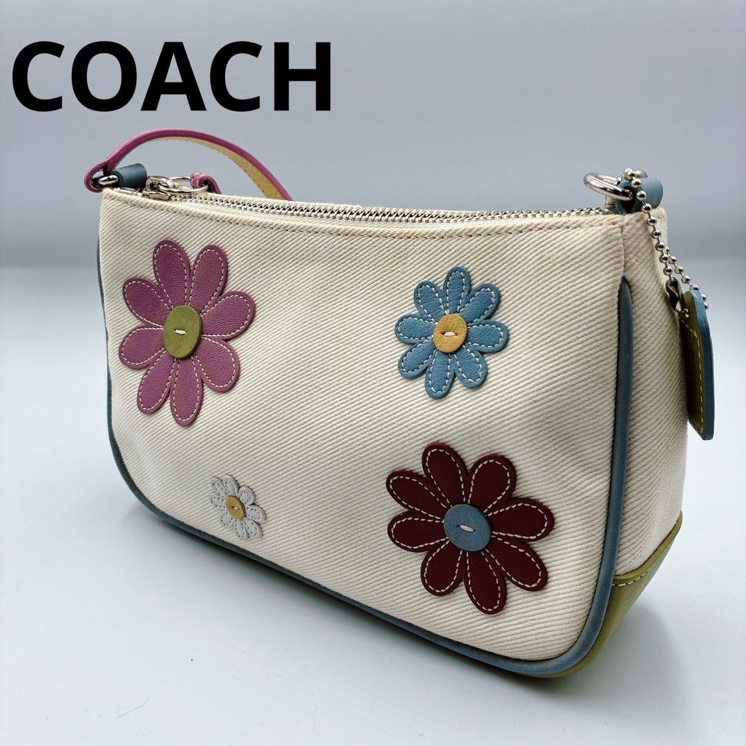 希少⭐️COACH コーチ　アクセサリーポーチ　渋谷限定　フラワー　アップリケ