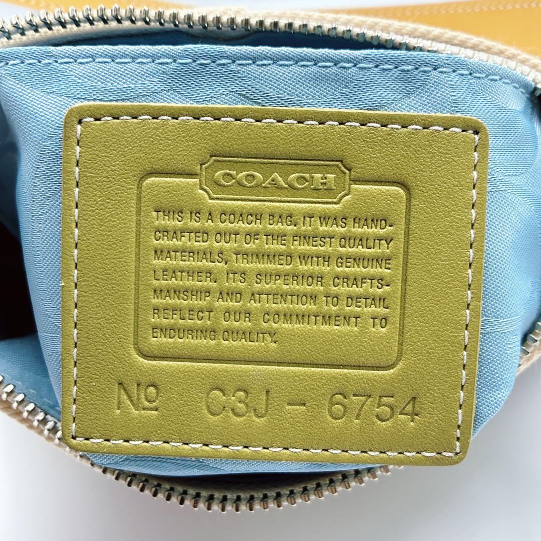 希少⭐️COACH コーチ　アクセサリーポーチ　渋谷限定　フラワー　アップリケ