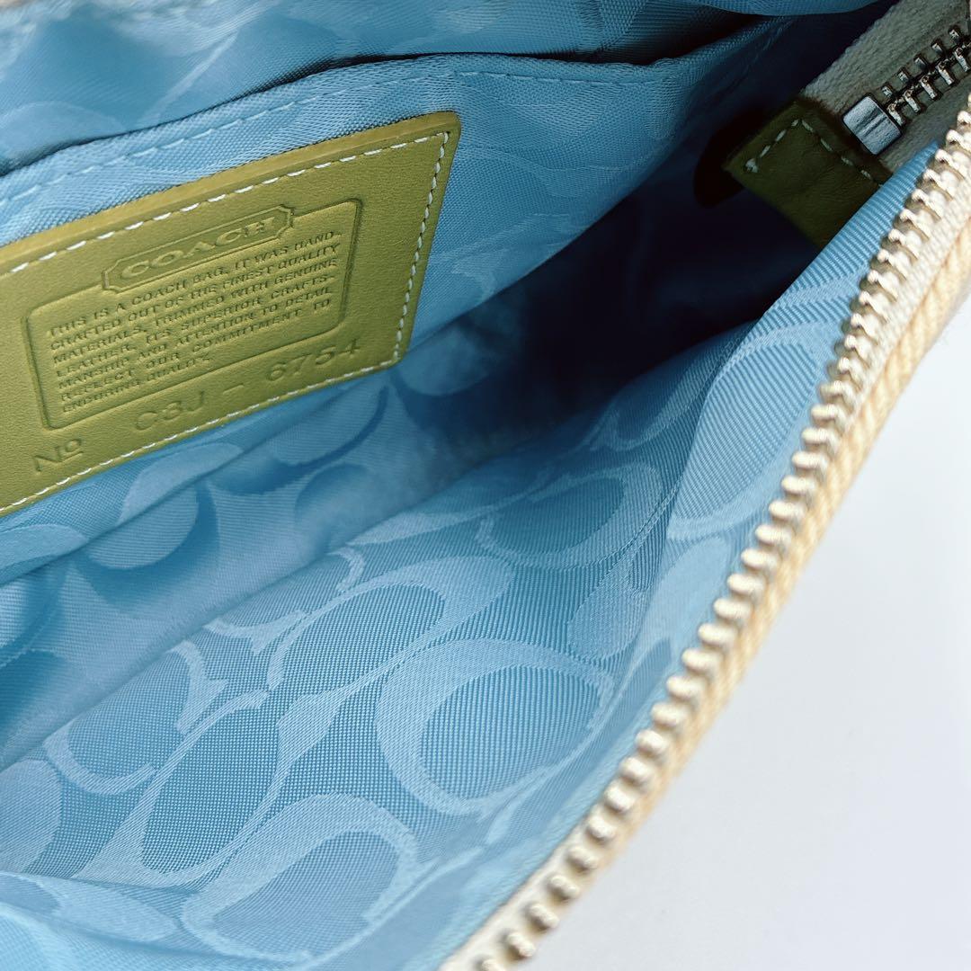 希少⭐️COACH コーチ　アクセサリーポーチ　渋谷限定　フラワー　アップリケ