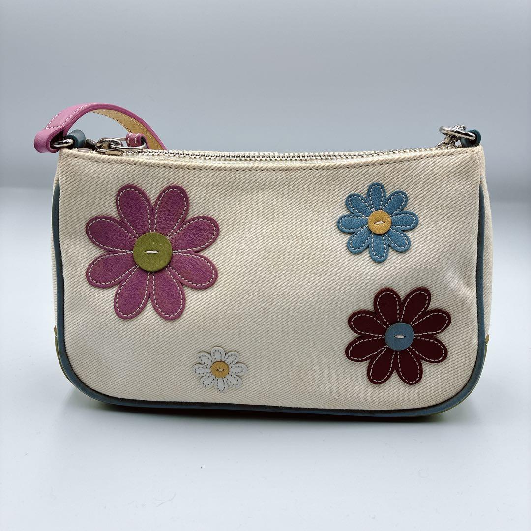 希少⭐️COACH コーチ　アクセサリーポーチ　渋谷限定　フラワー　アップリケ