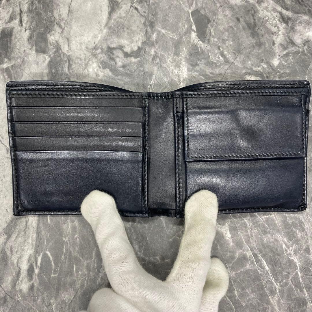 希少✨グッチ　二つ折り財布 ラウンドファスナー　蛇　GGスプリーム　レザー　黒