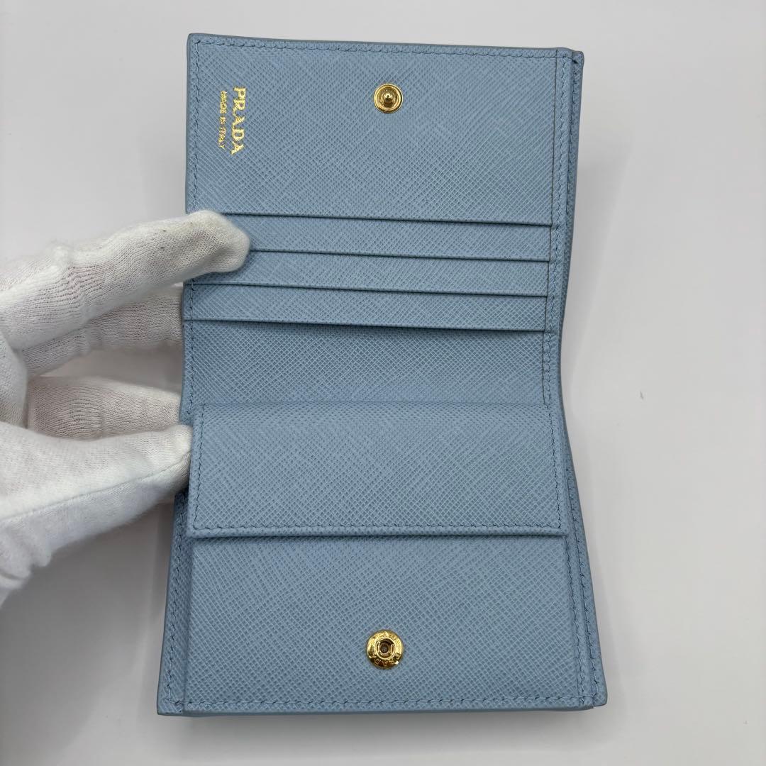 美品　PRADA 二つ折り財布　サフィアーノエンボス　ライトブルー 1MV204