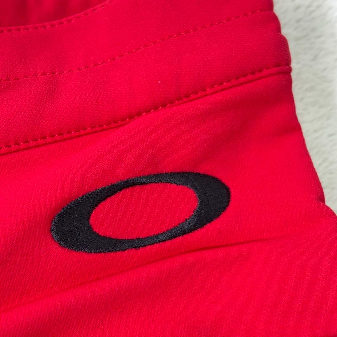 タグ付美品【OAKLEY】ゴルフパンツ 撥水 防寒 裏起毛 ロゴ刺繍 赤系 32