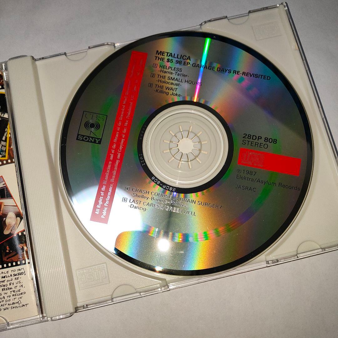 メタリカ The $5.98 E.P. - メタルガレージステッカー試験問題付き