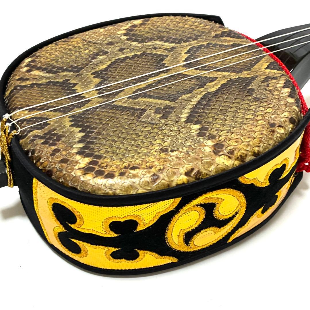 沖縄三味線 蛇皮 本革 黒 爪 ハードケース付き