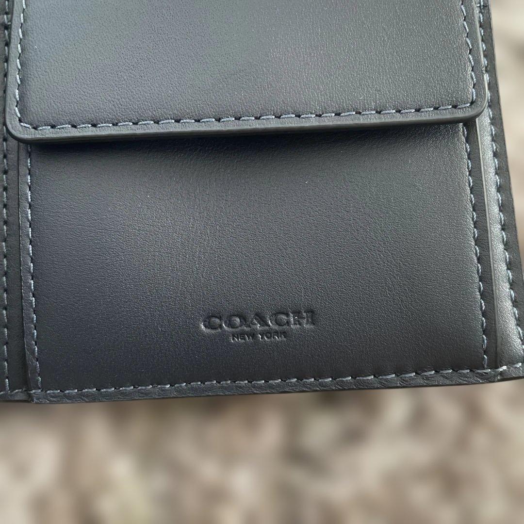 新品未使用　55,000円　COACH ミッドナイトネイビー 二つ折り財布