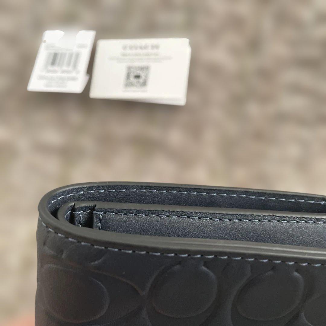 新品未使用　55,000円　COACH ミッドナイトネイビー 二つ折り財布