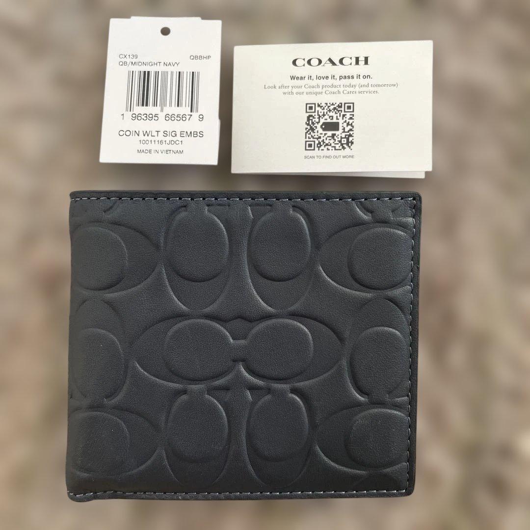 新品未使用　55,000円　COACH ミッドナイトネイビー 二つ折り財布