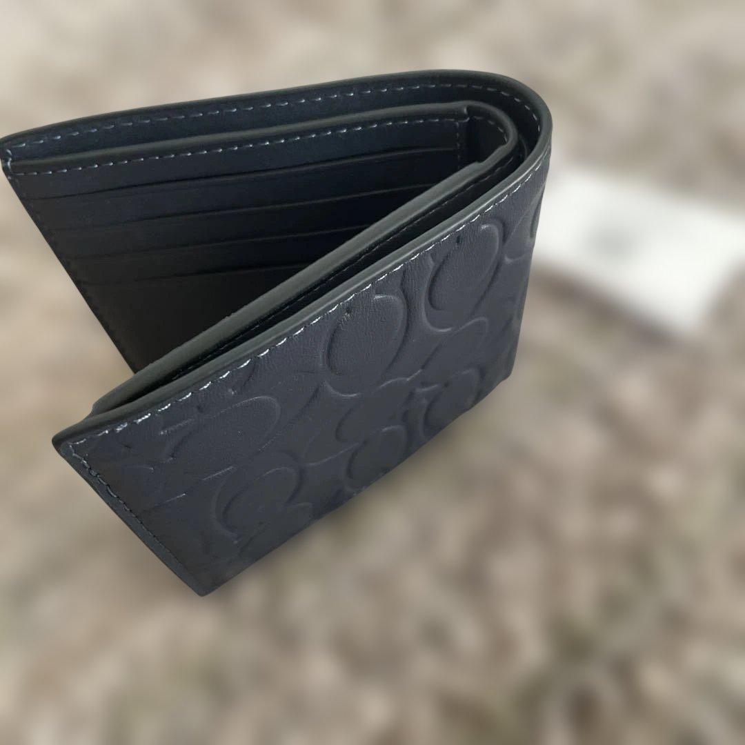 新品未使用　55,000円　COACH ミッドナイトネイビー 二つ折り財布