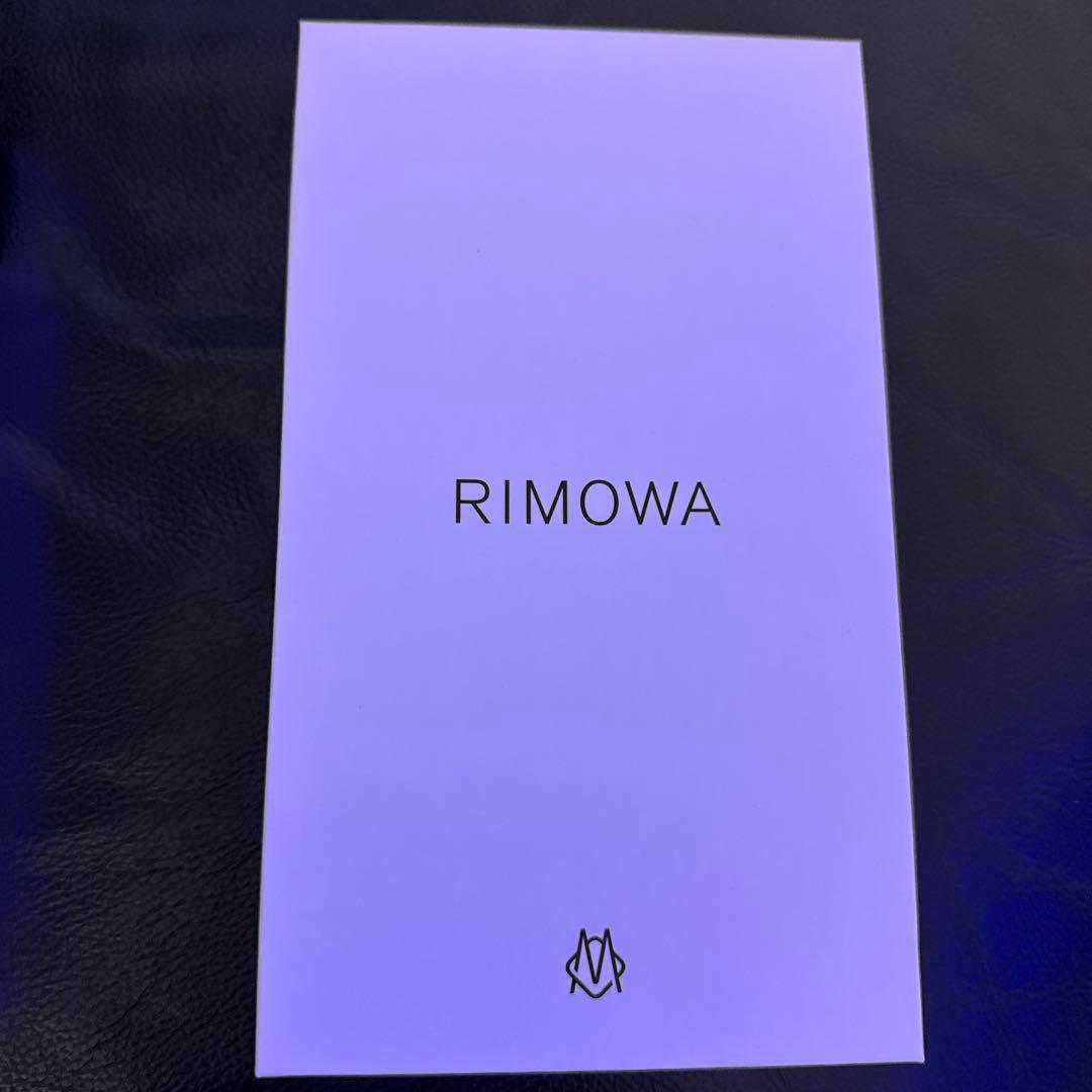 リモワiPhone14 Proポリカーボネート 虹色 ケース中古品