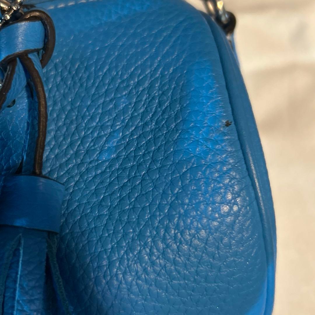 COACH タッセル付きショルダーバッグ