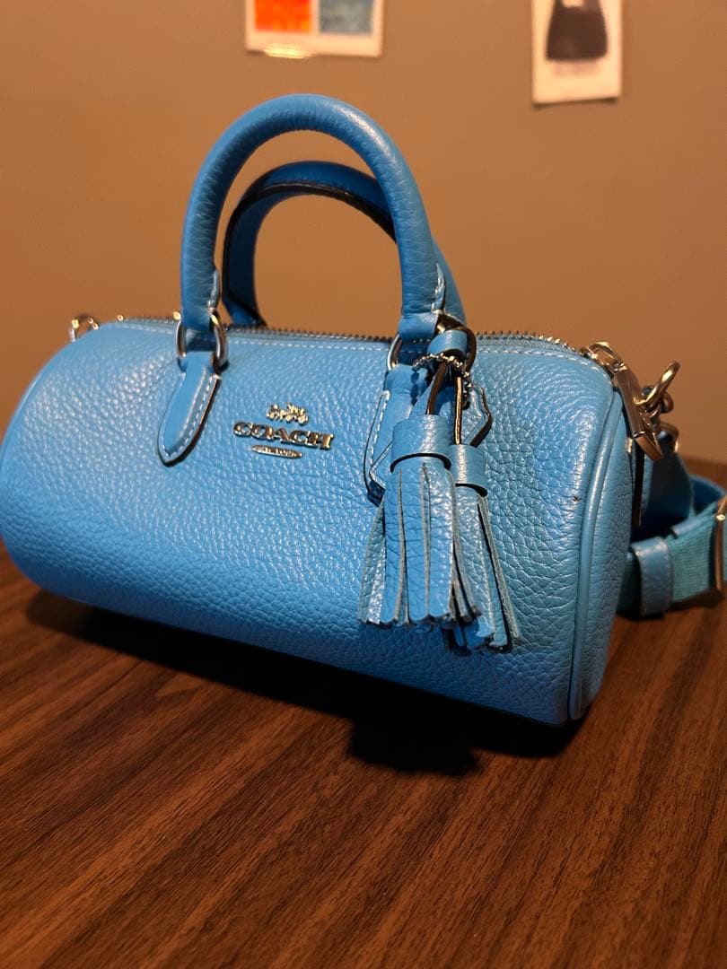 COACH タッセル付きショルダーバッグ