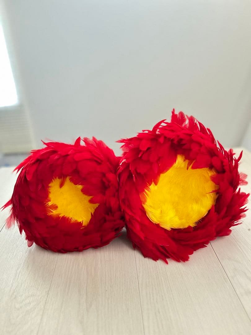 ウリウリ　フラダンス　タヒチアン　赤　羽　黄色　楽器　ハワイ　一体型　２個セット