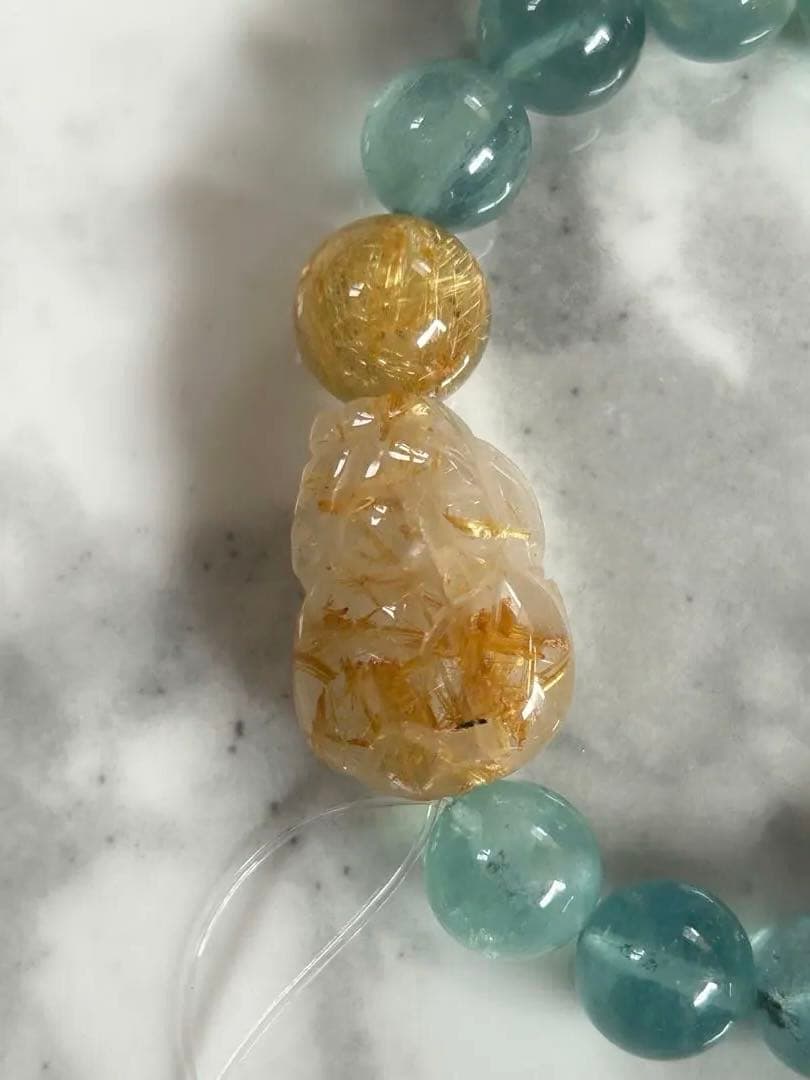 ゴールドルチルクォーツ貔貅ちゃんとアクアマリンのブレスレット