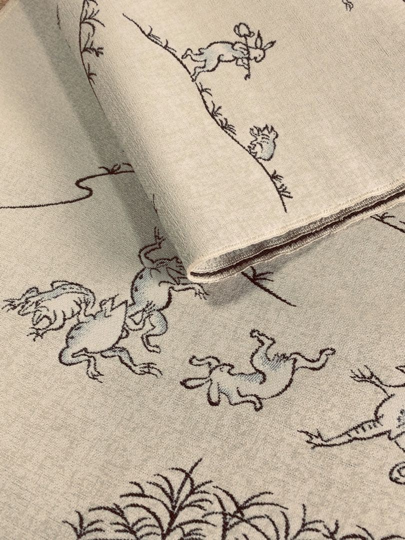 素敵な装い！西陣名古屋帯 綿芯手縫い仕立、ガード加工付 「鳥獣人物戯画」クリーム