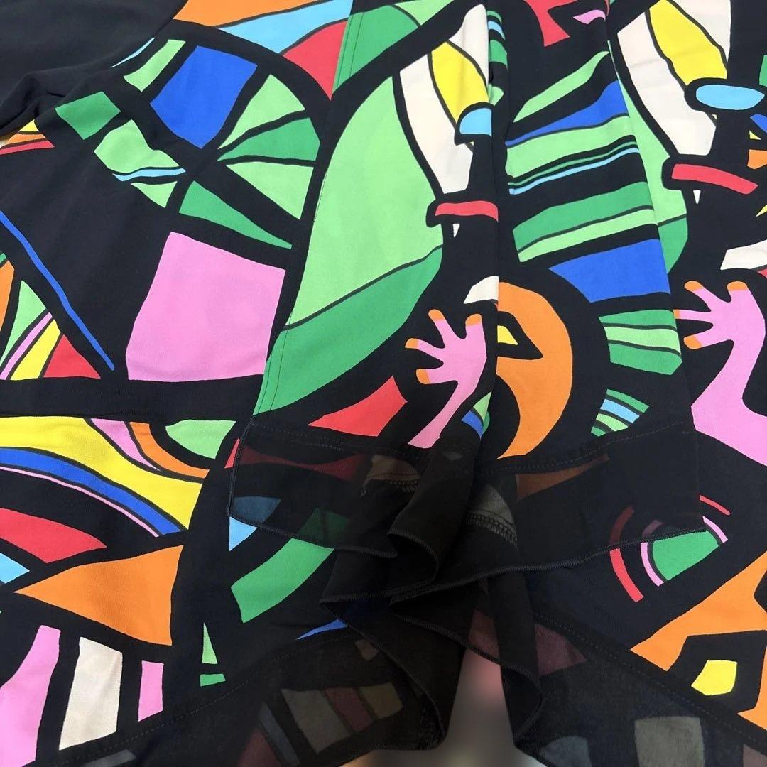 【新品未使用】✨トクコプルミエヴォル✨黒地に前開き陽気なカラフル柄のチュニック❣️