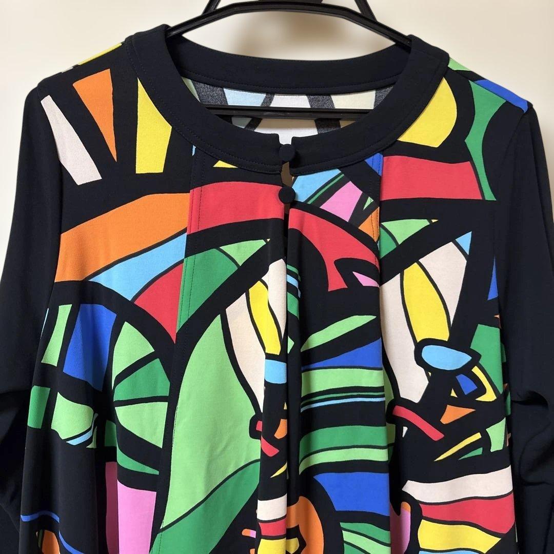 【新品未使用】✨トクコプルミエヴォル✨黒地に前開き陽気なカラフル柄のチュニック❣️