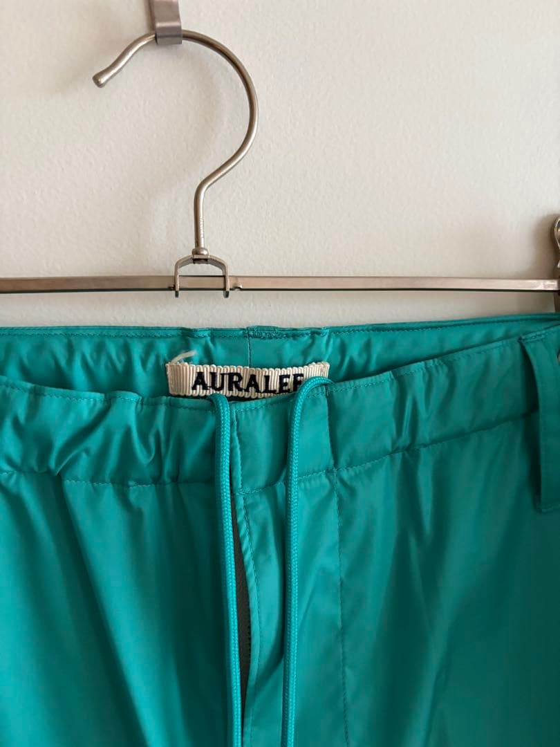 オーラリー AURALEEターコイズ ワークパンツ　ナイロン