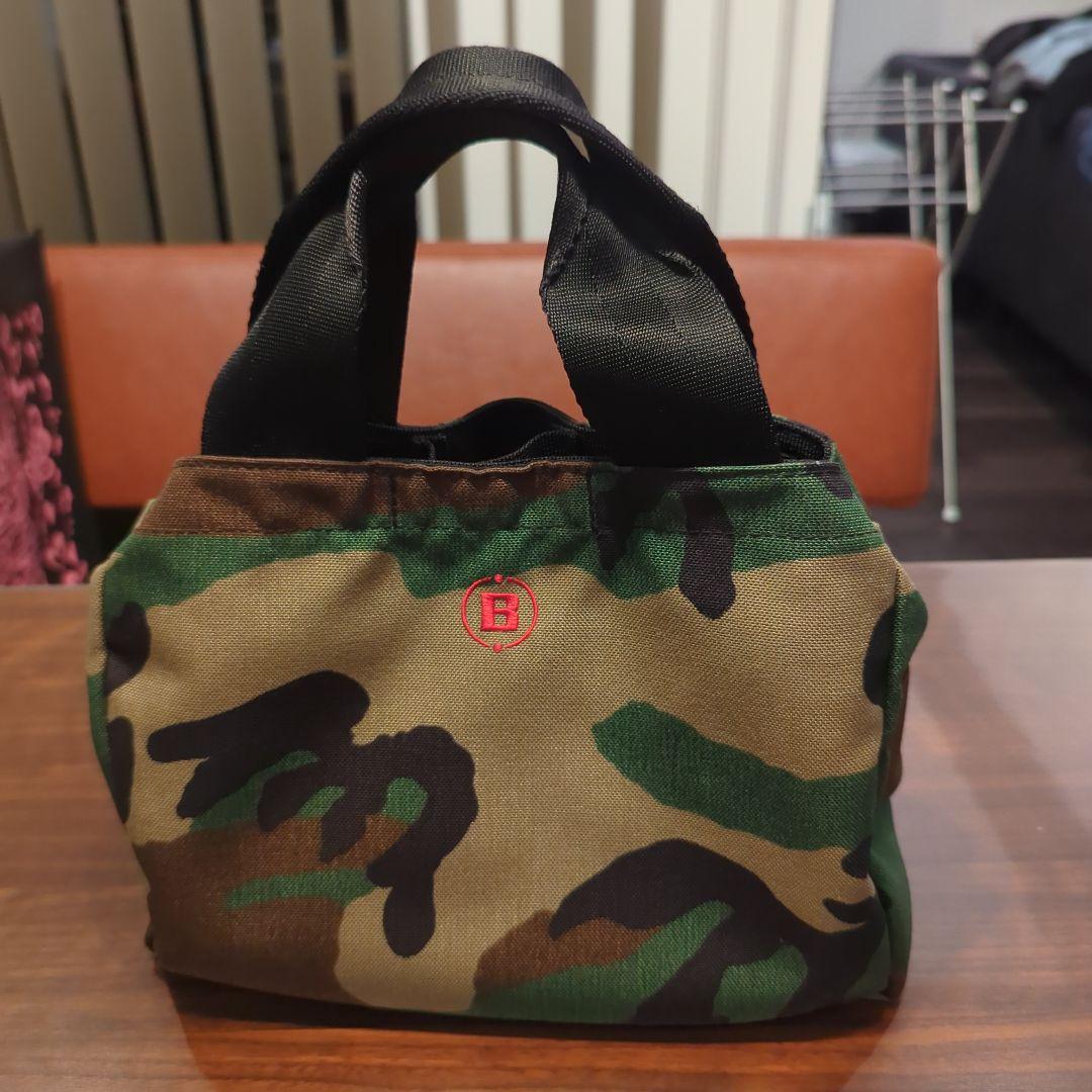 か*け様 BRIEFING 迷彩柄 ラウンドバッグ