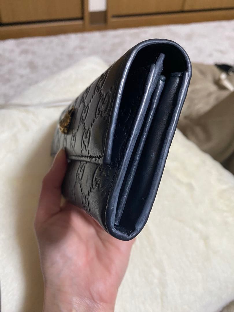 GUCCI 長財布 エンボスロゴ