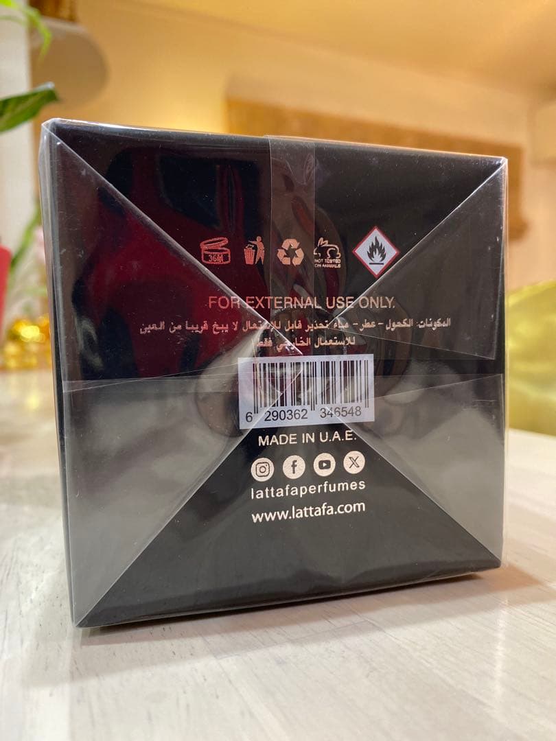 Lattafa Asad Elixir Si様