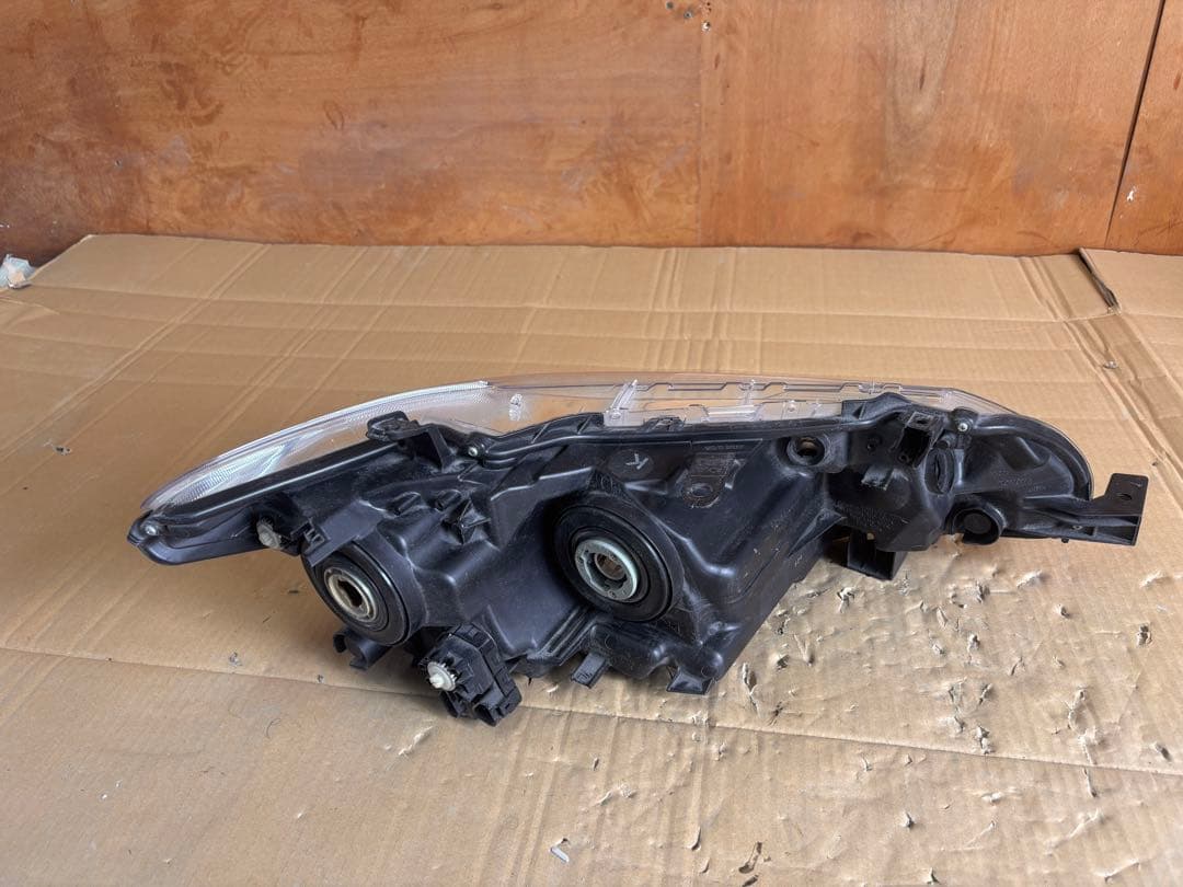 トヨタ　カローラフィールダー KOITO 12-595 左　ヘッドライト