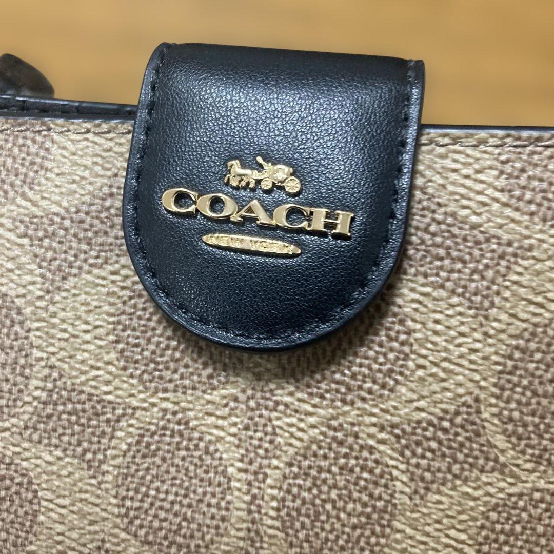 COACH 二つ折り財布 タン/ブラック