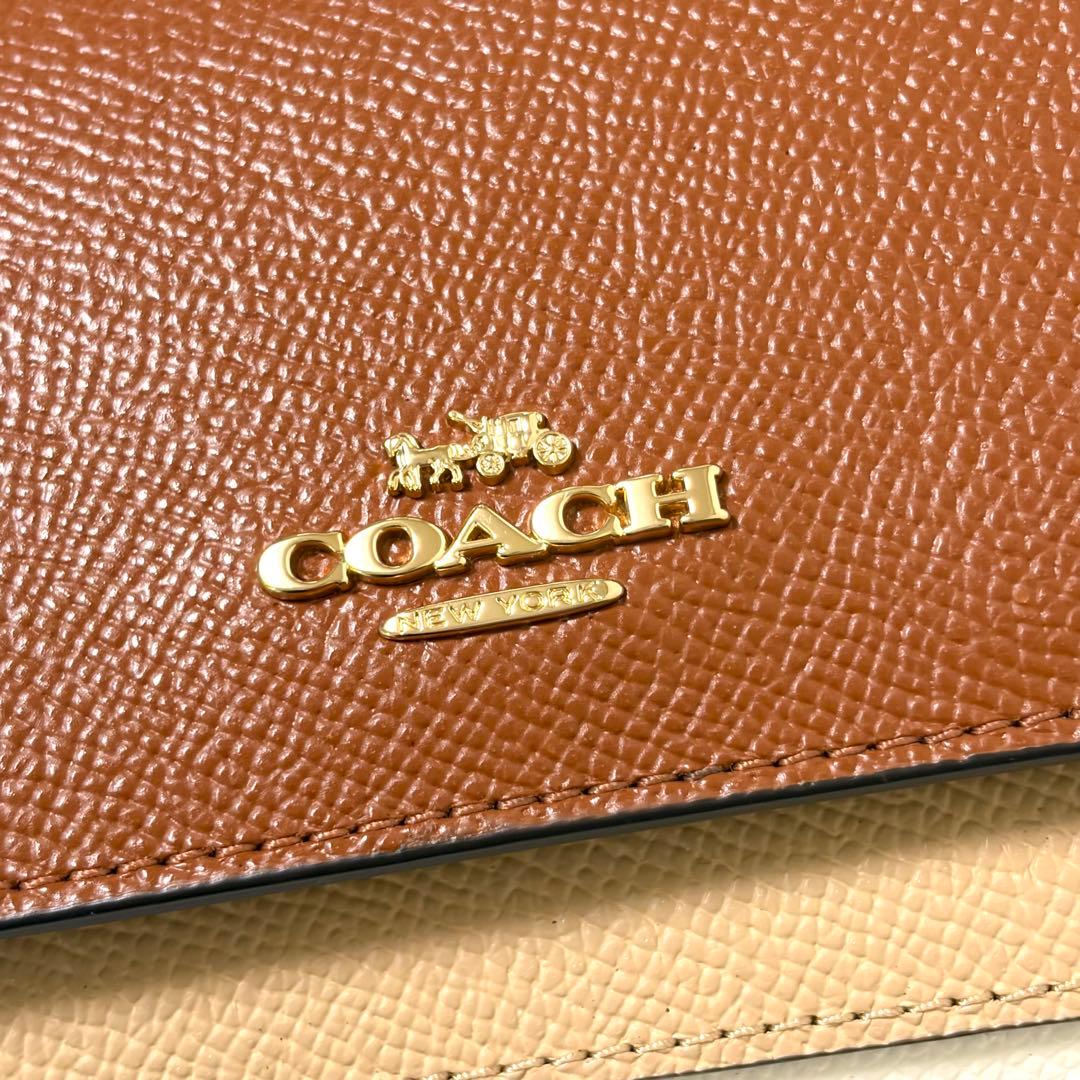 【未使用】COACH コーチ 二つ折り財布 レザー ブラウン マルチカラー
