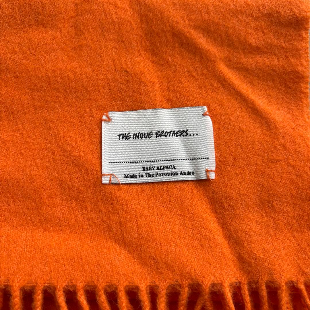 THE INOUE BROTHERS オレンジ マフラー